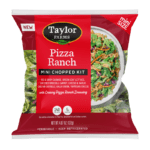 The Taylor Farms Pizza Ranch Mini Chopped Salad Kit package, showing red and savoy cabbage, green leaf lettuce, shredded broccoli, carrots, green onions, cheese and garlic crouton crumbles, parmesan cheese, and creamy Pizza Ranch Dressing.