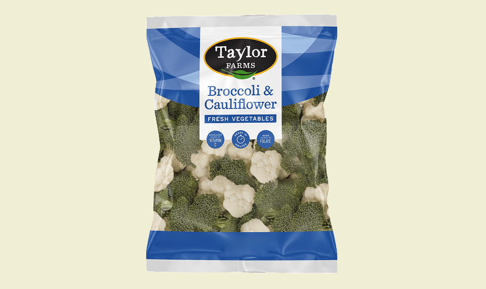 Fresh broccoli and cauliflower in a colorful display, showcasing nutritious vegetables perfect for healthy meals.