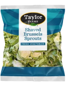 Fresh shaved Brussels sprouts in a vibrant salad, showcasing a healthy and delicious vegetable option.