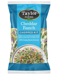 Creamy Cheddar Ranch dressing in a sleek bottle, perfect for salads and dips, from Taylor Farms.