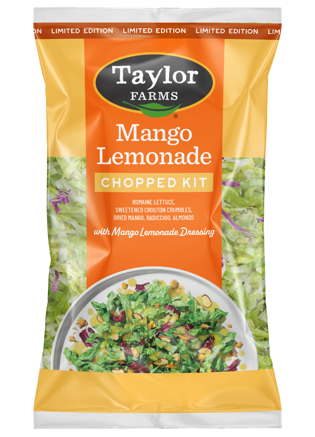 The Taylor Farms Mango Lemonade Chopped Salad Kit package, showing romaine lettuce, radicchio, sliced almonds, crouton crumbles, dried mango pieces, and the mango lemonade vinaigrette.