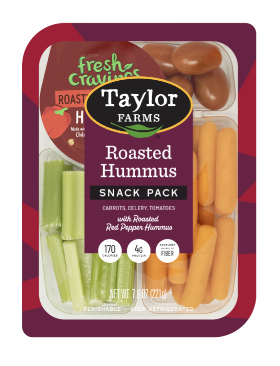 The Taylor Farms Veggies with Roasted Red Pepper Hummus Snack Pack package, showing baby carrots, sliced celery, grape tomatoes, and container of roasted red pepper hummus.