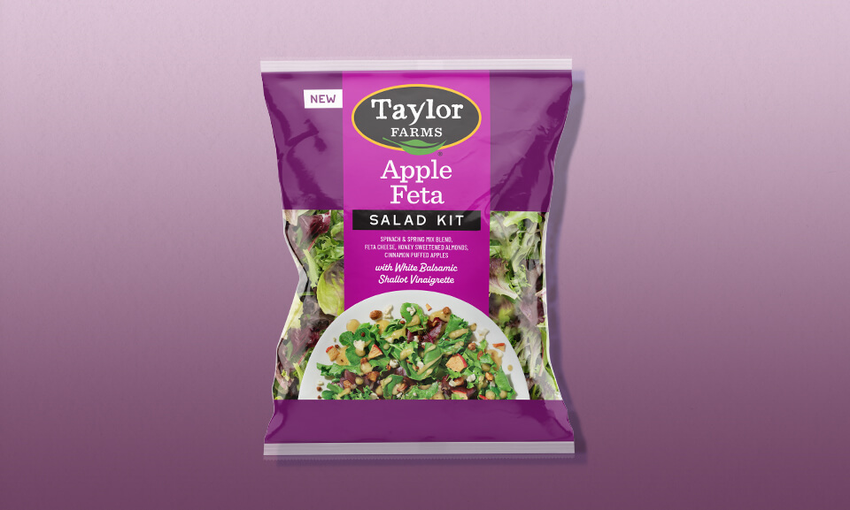 Apple Feta Salad Kit with vibrant greens and colorful ingredients in an appealing gradient packaging.
