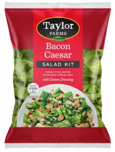 Bacon Caesar salad featuring crisp romaine, creamy dressing, and savory bacon pieces, perfect for a fresh meal.
