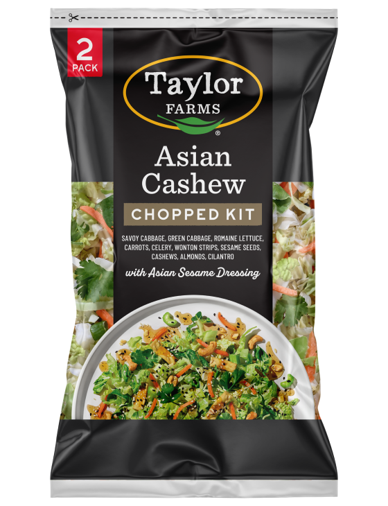 The Taylor Farms Asian Cashew Chopped Salad Kit package, showing cabbage, green cabbage, romaine, carrots, celery, wonton strips, sesame seeds, cashews, almonds, cilantro, and Asian sesame dressing.