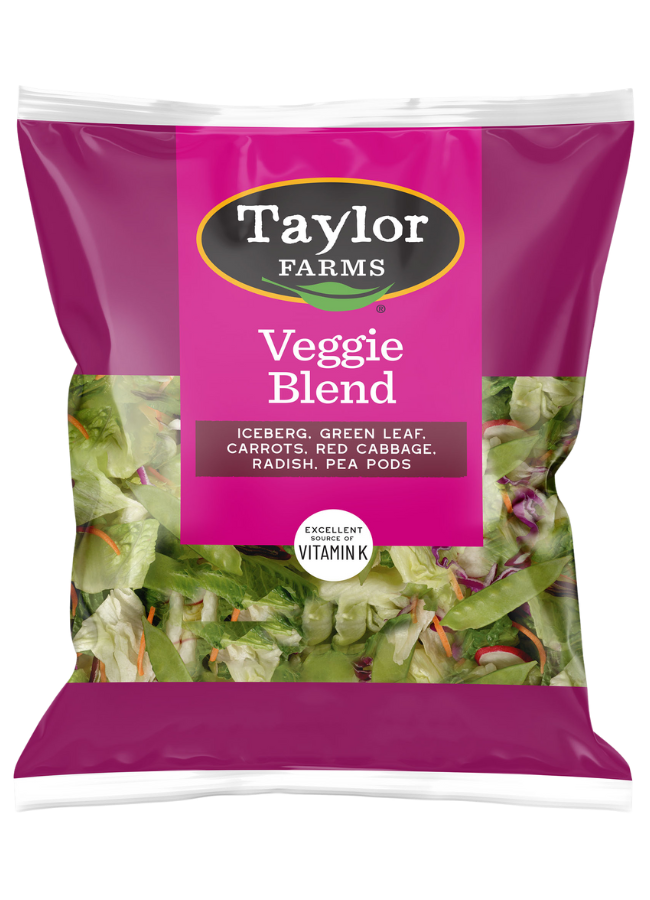 The Taylor Farms Veggie Blend package, chopped iceberg lettuce, green leaf lettuce, carrots, red cabbage, radishes, and pea pods.