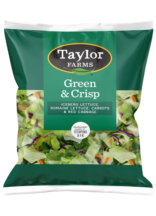The Taylor Farms Green & Crisp package, showing chopped iceberg lettuce, romaine lettuce, carrots, and red cabbage.