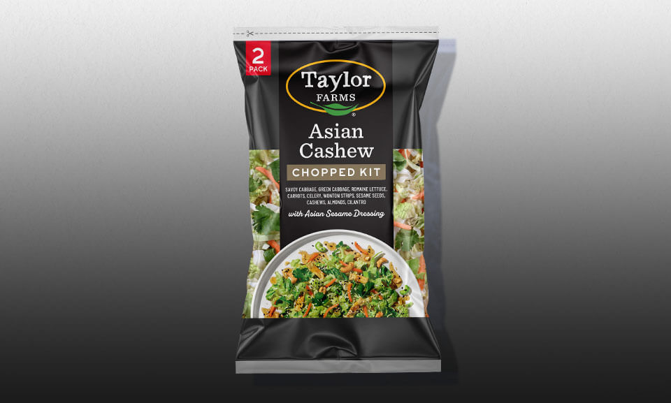 Asian Cashew salad mix with vibrant greens and crunchy cashews featured on a gradient background.