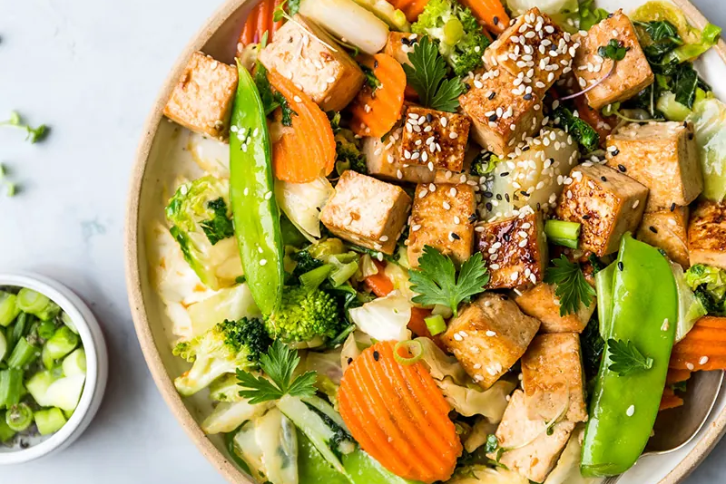 Colorful Taylor Farms stir fry featuring fresh vegetables and savory sauce, perfect for healthy meals.
