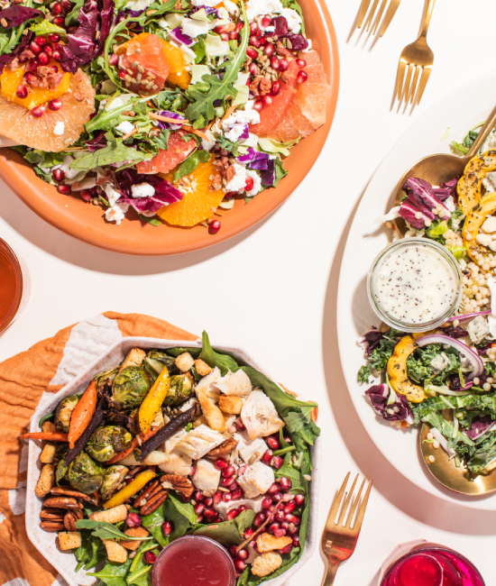 Three Taylor Farms salads on plates