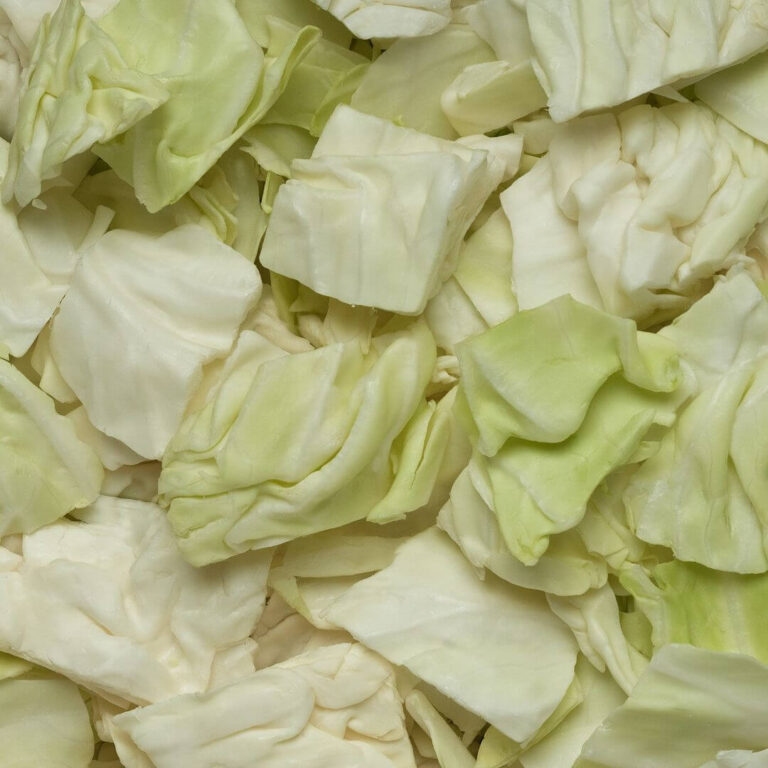 Fresh green cabbage chunks ready for salads, stir-fries, or healthy recipes.