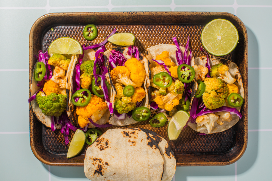 taylor farms rainbow cauliflower tacos on a metal tray