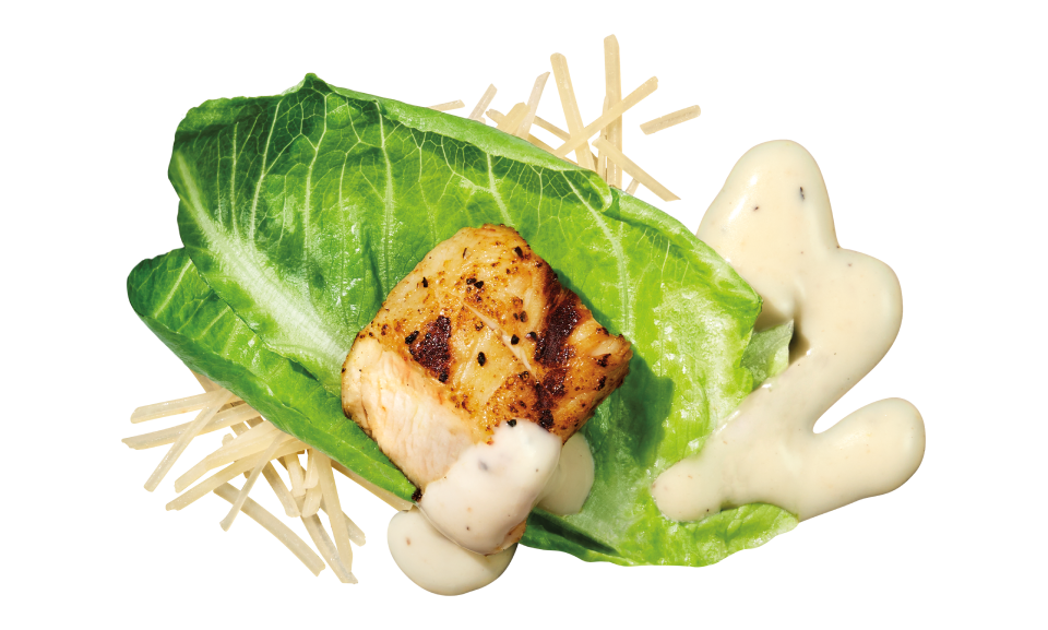 Caesar salad bowl with grilled chicken, romaine lettuce, croutons, and parmesan cheese from Taylor Farms.