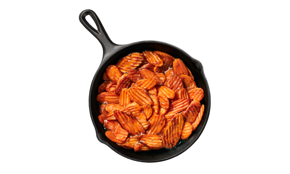 Sautéed brown sugar carrots in a cooking kit, ready to serve as a delicious side dish.
