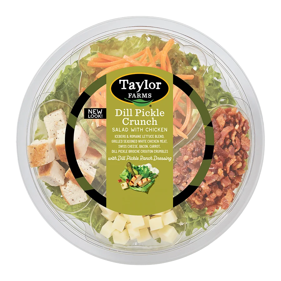Freshly prepared salad mix with vibrant greens, cherry tomatoes, and crunchy carrots in a clear bowl.