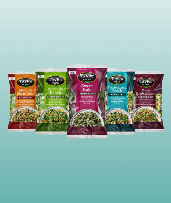 Healthy meal featuring fresh salads, vibrant vegetables, and tasty dressings from Taylor Farms.