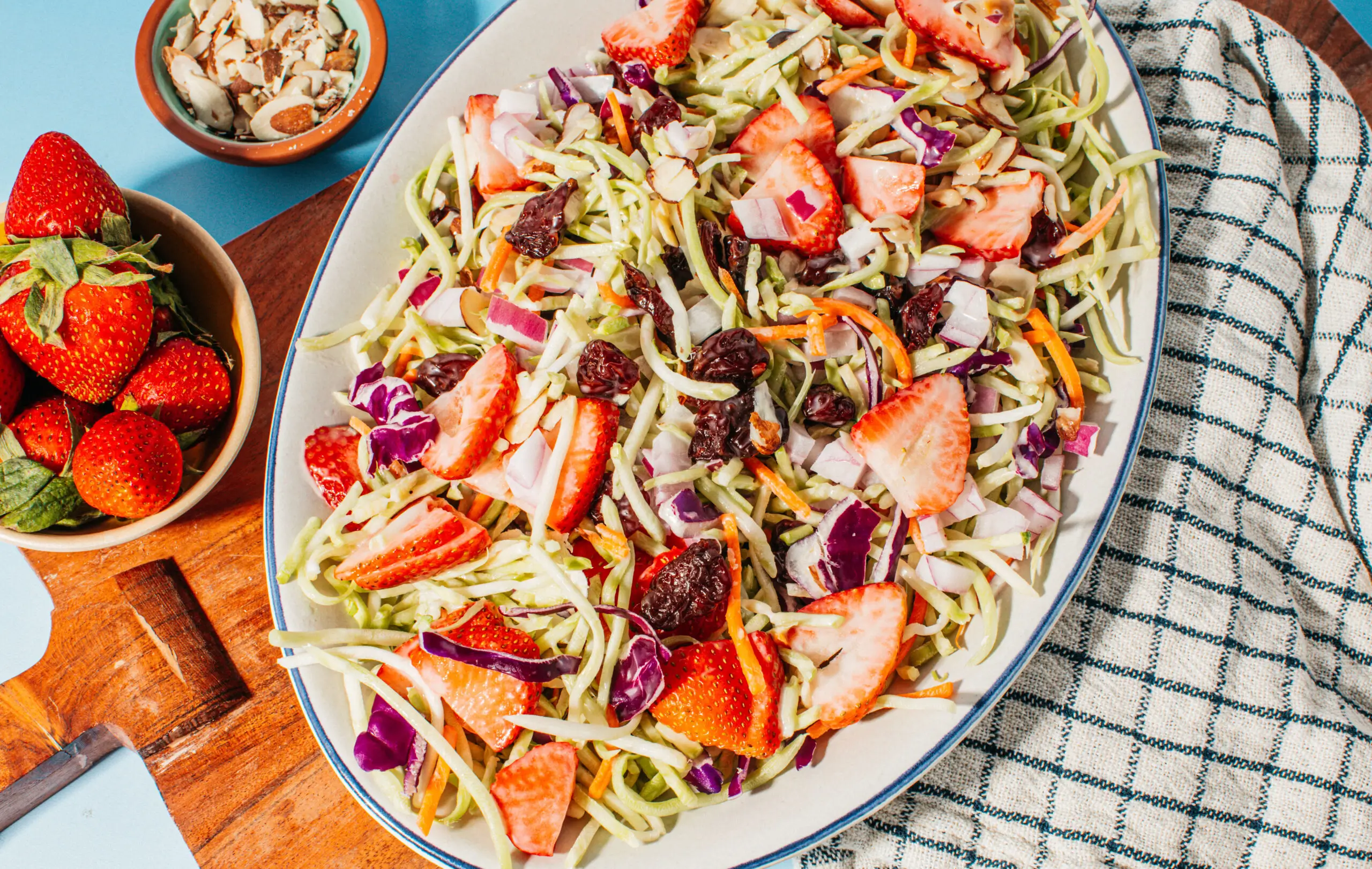 Freshly packaged Taylor Farms salad with vibrant greens and colorful vegetables, perfect for healthy meals.