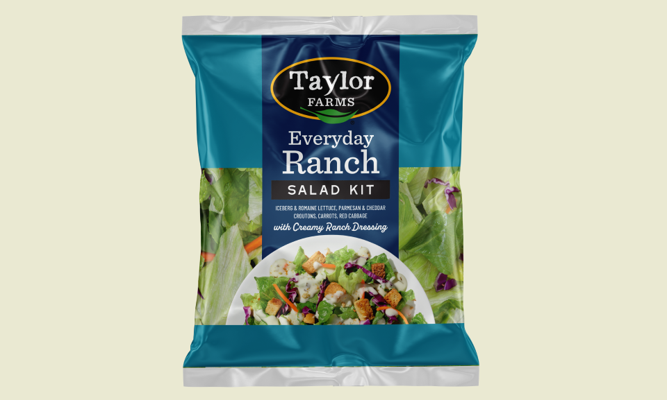 Creamy ranch dressing from Taylor Farms served with fresh vegetables, ideal for healthy salads and snacks.