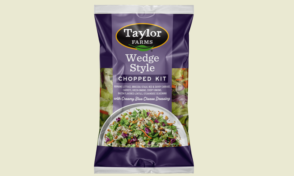 Fresh Wedge Chopped Kit with crisp lettuce, tomatoes, cheese, and dressing, perfect for a healthy salad option.