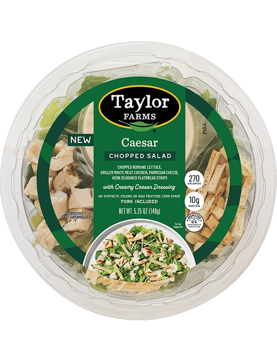 Taylor Farms Caesar chopped salad bowl with fresh romaine, croutons, and creamy dressing.