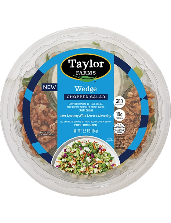 Taylor Farms Wedge Chopped Salad Bowl featuring fresh greens, tomatoes, and savory toppings in a convenient serving container.