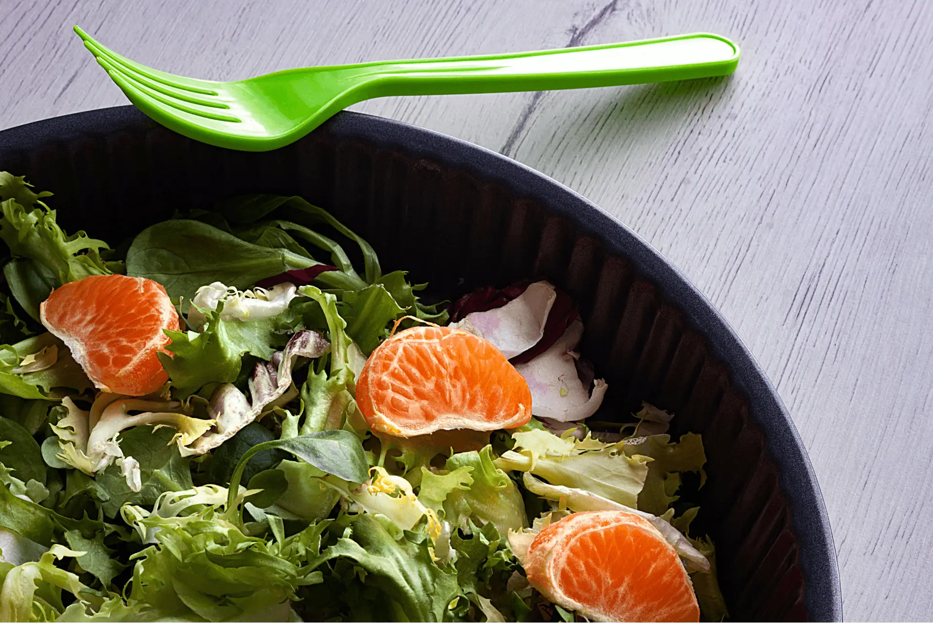 Fresh escarole lettuce with vibrant green leaves, ideal for salads and cooking.